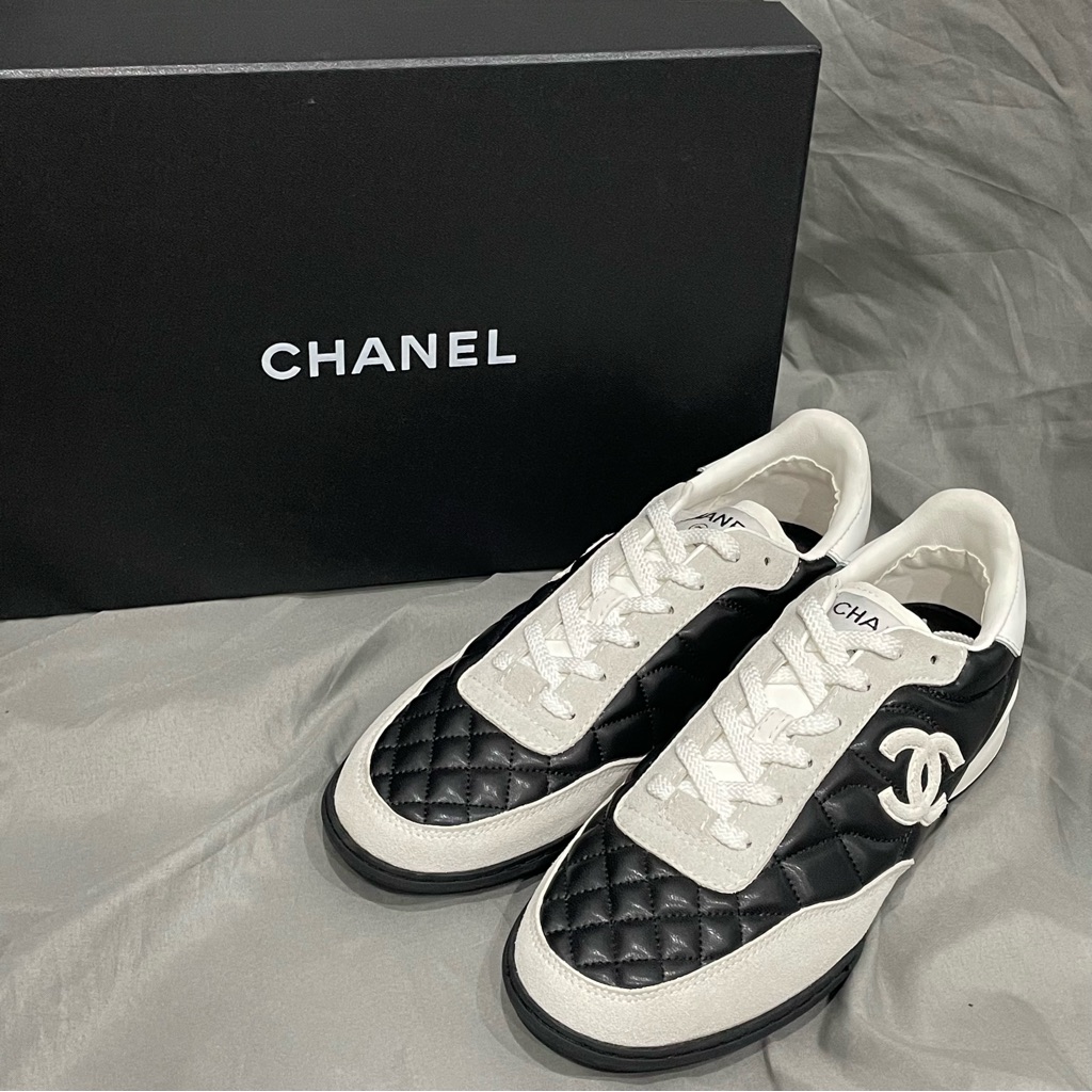 Chanel Womenâs Black And White Sneakers